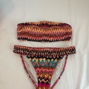 Boden smocked bikini set
Top & bottom: Women’s size 6